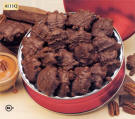 PECANBACKS - Crisp roasted pecans are smothered in creamy caramel and coated with rich chocolate. Red tin is engravable